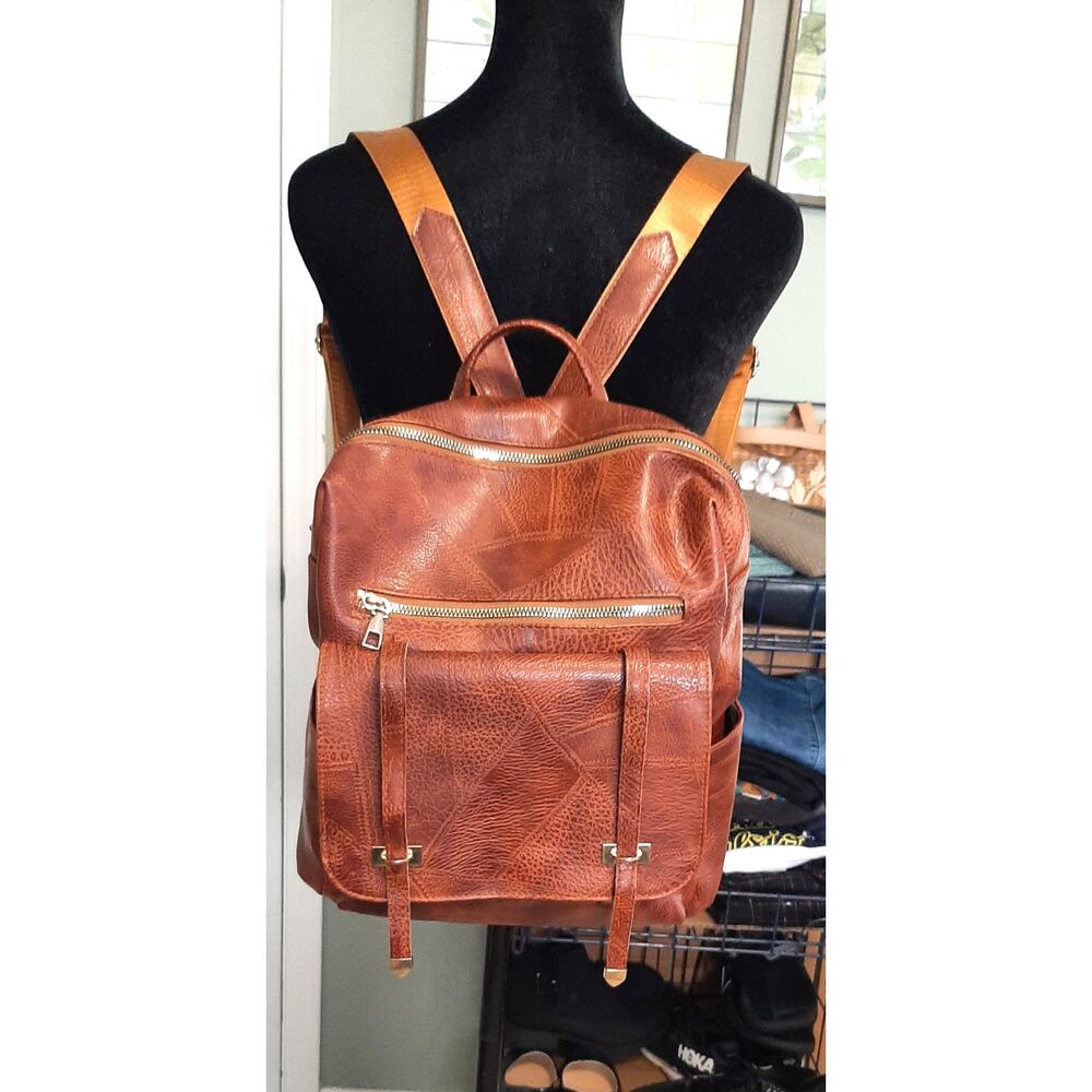 Large Faux Leather Backpack With Adjustable Straps and Gold Detail